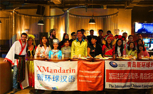 Xmandarin students and teachers enjoy a special costume party and event together in a Qingdao pub